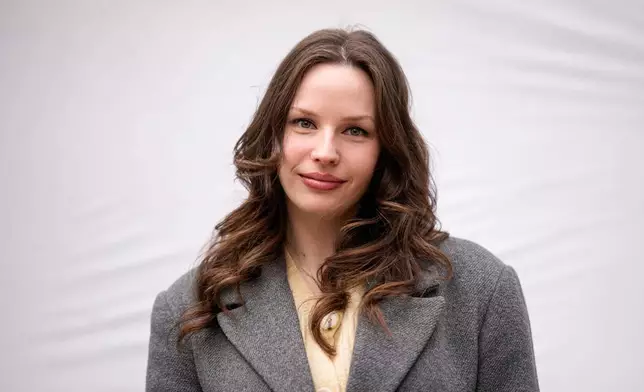 Dori Szaday, 22, poses for a portrait in Budapest, Hungary, Monday, April 13, 2026. "There's a belief that Hungarians are willing to put up with anything. We finally proved that wrong." (AP Photo/Petr David Josek)