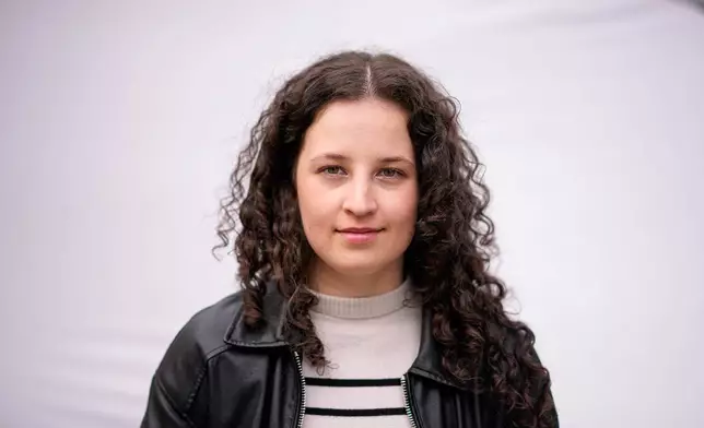 Mira Nagy, 19, poses for a portrait in Budapest, Hungary, Monday, April 13, 2026. "I listened a lot of podcasts, I did my research and I figured out that staying in power for sixteen years was not okay. That defeats the point of democracy." (AP Photo/Petr David Josek)