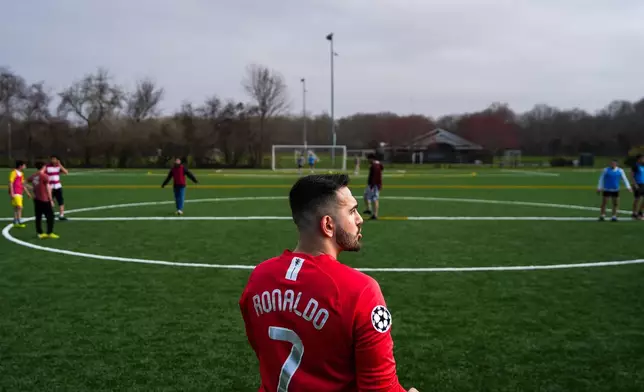 Tehran native and Stony Brook University graduate student Arad Ershad plays soccer with friends at Stony Brook University in Stony Brook, N.Y., Friday, April 3, 2026. (AP Photo/Ryan Murphy)