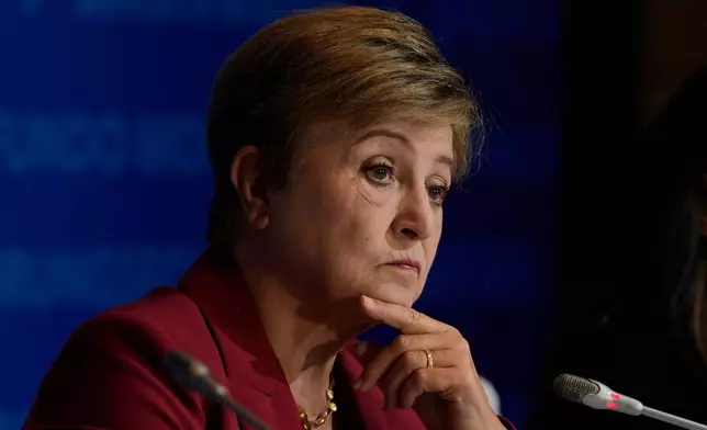 FILE - Kristalina Georgieva, managing director of the International Monetary Fund (IMF), listens during a briefing in Beijing, China, Dec. 10, 2025. (AP Photo/Ng Han Guan, File)