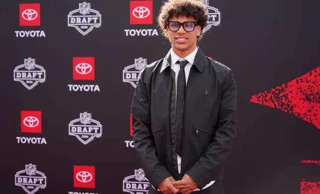 Arizona State wide receiver Jordyn Tyson poses on the red carpet before the first round of the NFL football draft, Thursday, April 23, 2026, in Pittsburgh. (AP Photo/Gene J. Puskar)