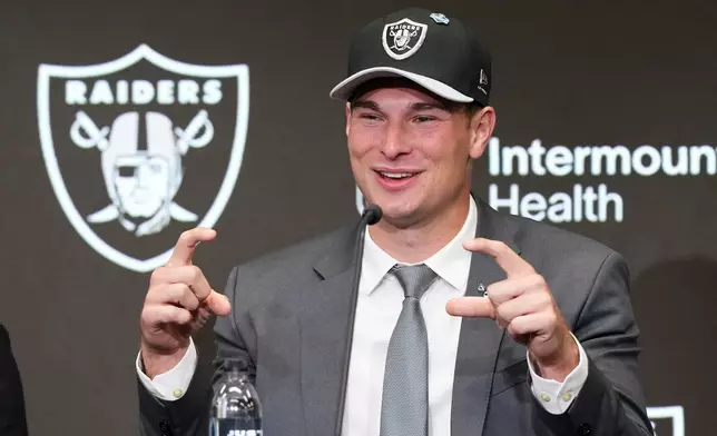 Las Vegas Raiders first-round draft pick Fernando Mendoza speaks during an NFL football news conference Friday, April 24, 2026, in Henderson, Nev. (AP Photo/Candice Ward)