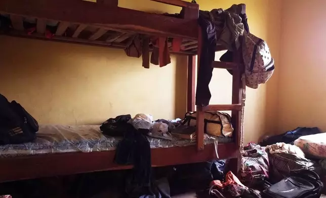 Students' belongings are seen inside a dormitory of an orphanage that was raided by gunmen late Sunday, in Lokoja, Nigeria, Monday, April 27, 2026. (AP Photo/Haruna Yahaya)