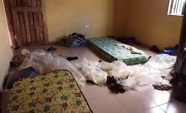 Students' belongings are seen inside a dormitory of an orphanage that was raided by gunmen late Sunday, in Lokoja, Nigeria, Monday, April 27, 2026. (AP Photo/Haruna Yahaya)