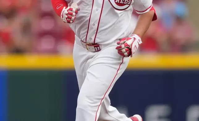 Cincinnati Reds' Sal Stewart runs the bases after hitting a three-run homer during the first inning of a baseball game against the San Francisco Giants in Cincinnati, Wednesday, April 15, 2026. (AP Photo/Carolyn Kaster)