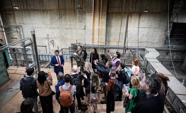 Matt Floca, the John F. Kennedy Center for the Performing Arts' new executive director and chief operating officer, shows aged equipment in the river pump room during a media tour intended to show building damage, Wednesday, April 22, 2026, in Washington. (AP Photo/Julia Demaree Nikhinson)