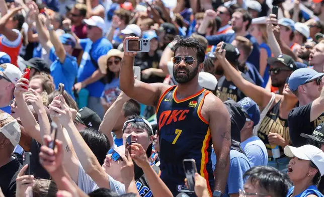 FILE - Oklahoma City Thunder fans attend a celebration of the Thunder's NBA basketball championship Tuesday, June 24, 2025, in Oklahoma City. (AP Photo/Nate Billings, File)