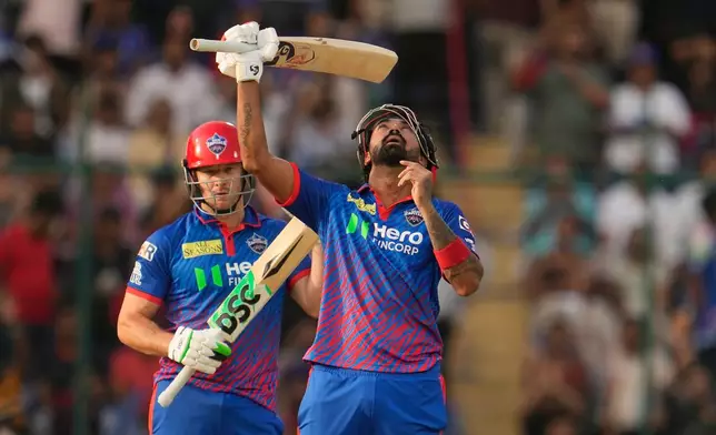 Delhi Capitals' KL Rahul celebrates after scoring one hundred and fifty runs during the Indian Premier League cricket match between Delhi Capitals and Punjab Kings in New Delhi, India, Saturday, April 25, 2026. (AP Photo/Manish Swarup)