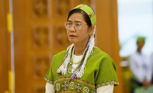 Myanmar newly elected Vice President Nan Ni Ni Aye arrives for a sworn-in ceremony at Union parliament in Naypyitaw, Myanmar, Friday, April 10, 2026. (AP Photo/Aung Shine Oo)