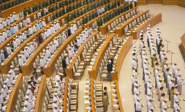 Myanmar newly appointed cabinet ministers gather to take oaths during a sworn-in ceremony at Union parliament in Naypyitaw, Myanmar, Friday, April 10, 2026.(AP Photo/Aung Shine Oo)