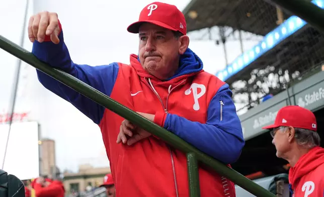 Philadelphia Phillies manager Rob Thomson looks to the field before a baseball game against the Chicago Cubs in Chicago, Monday, April 20, 2026. (AP Photo/Nam Y. Huh)