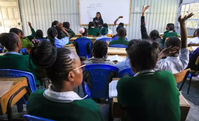 Florida Cherotich teaches Swahili lesson at Greenland Girls School in Kiserian, Kajiado, Kenya, March 5, 2026. (AP Photo/Andrew Kasuku)