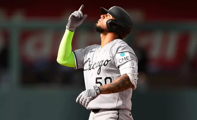 Chicago White Sox's Lenyn Sosa celebrates on second after hitting a double during the seventh inning of a baseball game against the Kansas City Royals, Saturday, April 11, 2026, in Kansas City, Mo. (AP Photo/Charlie Riedel)