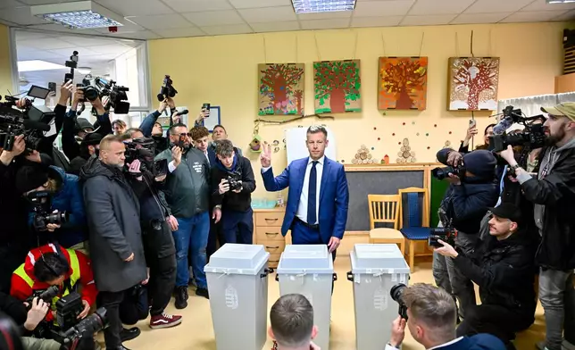 Peter Magyar, leader of the opposition Tisza party, reacts after casting his ballot at a polling station in Budapest, Hungary, Sunday, April 12, 2026. (AP Photo/Denes Erdos)