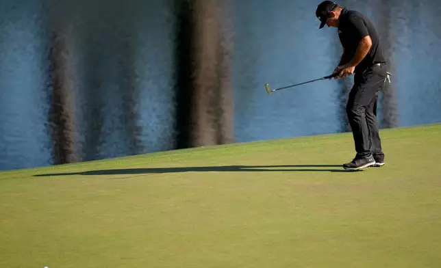 Patrick Reed reacts after missing a putt on the 15th hole during the second round of the Masters golf tournament at the Augusta National Golf Club, Friday, April 10, 2026, in Augusta, Ga. (AP Photo/Ashley Landis)