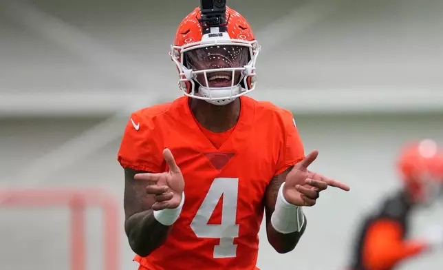 Cleveland Browns quarterback Deshaun Watson (4) gestures during an NFL football practice, Wednesday, May 20, 2026, in Berea, Ohio. (AP Photo/Sue Ogrocki)