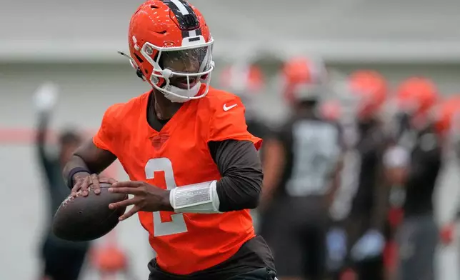 Cleveland Browns quarterback Shedeur Sanders passes during an NFL football practice, Wednesday, May 20, 2026, in Berea, Ohio. (AP Photo/Sue Ogrocki)