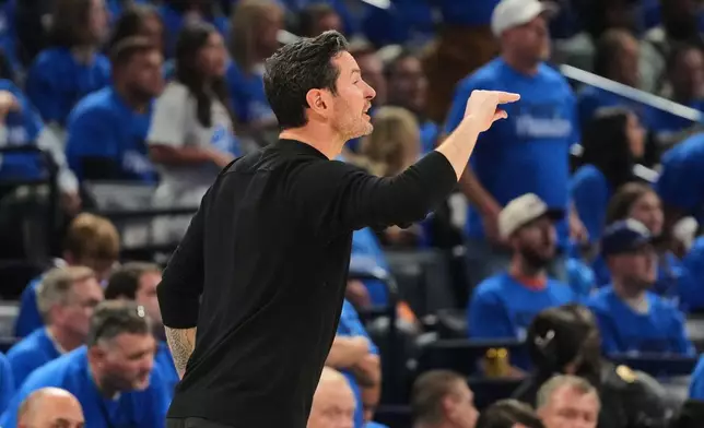 Los Angeles Lakers head coach JJ Redick reacts to play in the second half of Game 1 in a second-round NBA basketball playoffs series against the Oklahoma City Thunder Tuesday, May 5, 2026 in Oklahoma City. (AP Photo/Kyle Phillips)