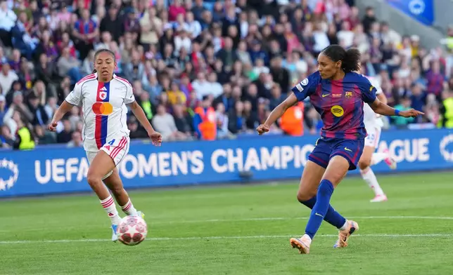Barcelona's Salma Paralluelo scores her side's fourth goal during the Women's Champions League final soccer match between FC Barcelona and OL Lyonnes, in Oslo, Saturday, May 23, 2026. (AP Photo/Kirsty Wigglesworth)