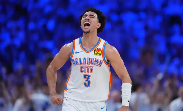 Oklahoma City Thunder guard Jared McCain (3) reacts to a basket against the San Antonio Spurs in the second half of Game 5 in the Western Conference finals NBA basketball playoffs series, Tuesday, May 26, 2026, in Oklahoma City. (AP Photo/Julio Cortez)