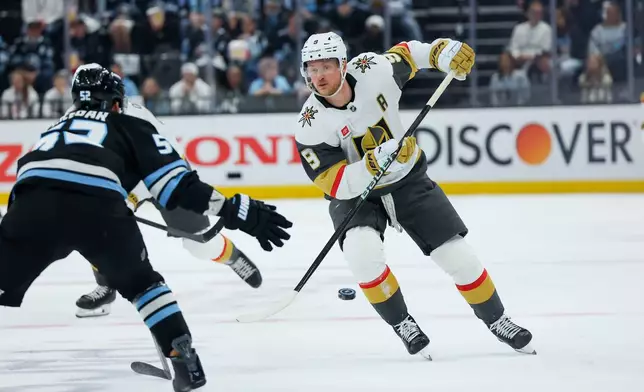 Vegas Golden Knights center Jack Eichel (9) passes the puck during the second period of Game 6 in the first round of an NHL hockey Stanley Cup playoff series against the Utah Mammoth, Friday, May 1, 2026, in Salt Lake City. (AP Photo/Melissa Majchrzak)