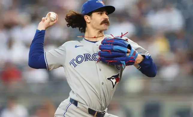 Toronto Blue Jays pitcher Dylan Cease throws during the first inning of a baseball game against the New York Yankees, Tuesday, May 19, 2026, in New York. (AP Photo/Heather Khalifa)
