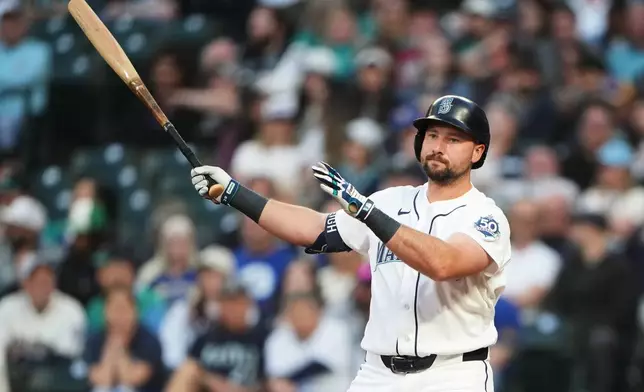 Seattle Mariners designated hitter Cal Raleigh strikes out against the Atlanta Braves during the fifth inning of a baseball game, Tuesday, May 5, 2026, in Seattle. (AP Photo/Lindsey Wasson)