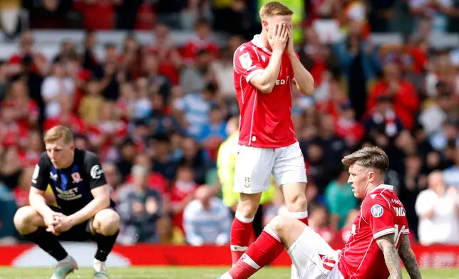 Wrexham's Josh Windass reacts at the end of the EFL Championship soccer match between Wrexham and Middlesbrough, in Wrexham, Wales, Saturday May 2, 2026. (Cody Froggatt/PA via AP)