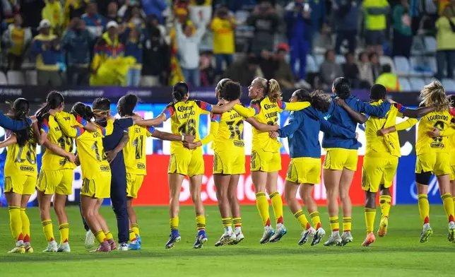 Players of Mexico's America celebrate after winning the Women's CONCACAF Champions Cup final soccer match against The United States' Washington Spirit in Pachuca, Mexico, Saturday, May 23, 2026.(AP Photo/Fernando Llano)