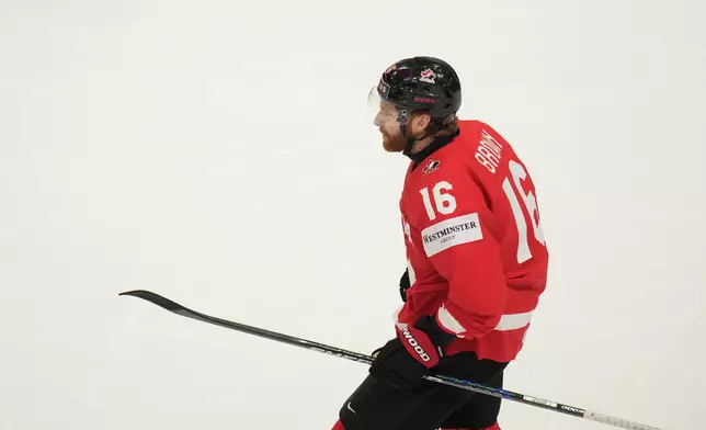 Canada's Connor Brown (16) celebrates after scoring a goal during the third period of the 2026 IIHF Men's Ice Hockey World Championship quarterfinal match between Canada and United States, in Fribourg, Switzerland, Thursday, May 28, 2026. (AP Photo/Darko Bandic)