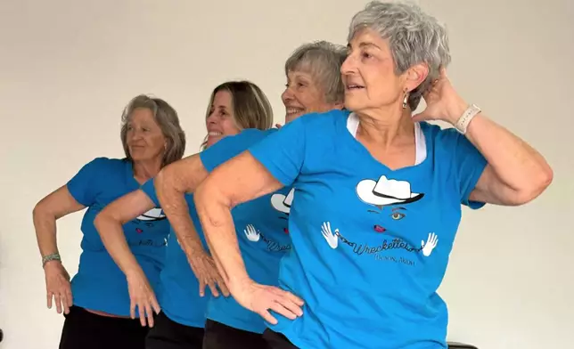 Gail Kowalski, from left, Suzy Rhoades, Carol Ross and Cindy Soffrin, of The Rodeo City Wreckettes, a tap and jazz dance group for older women, practice on Thursday, April 16, 2026, in Tucson, Ariz. (Anita Snow via AP)
