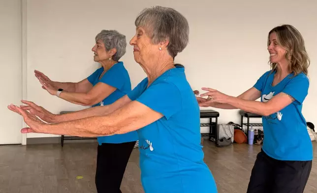 Cindy Soffrin, from left, Carol Ross, and Suzy Rhoades, of The Rodeo City Wreckettes, a tap and jazz dance group for older women, practice on Thursday, April 16, 2026, in Tucson, Ariz. (Anita Snow via AP)