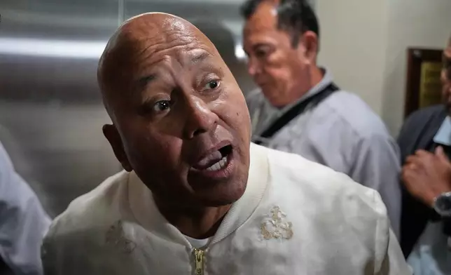 Philippine Senator Ronald dela Rosa speaks to reporters at the Philippine Senate in Pasay, Philippines on Tuesday, May 12, 2026. (AP Photo/Aaron Favila)