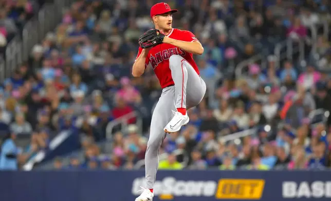 Los Angeles Angels pitcher Jack Kochanowicz winds up to deliver against the Toronto Blue Jays during baseball game action in Toronto, Saturday, May 9, 2026. (Chris Young/The Canadian Press via AP)