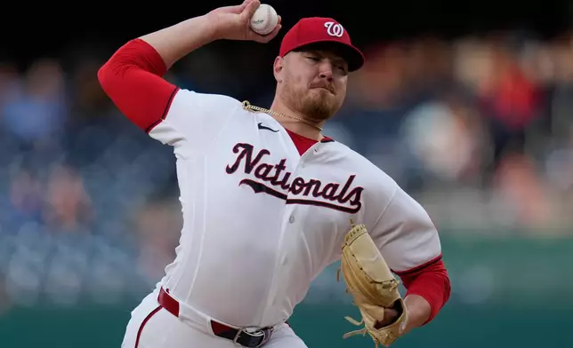 Washington Nationals starting pitcher Cade Cavalli throws to the Minnesota Twins during the first inning of a baseball game, Tuesday, May 5, 2026, in Washington. (AP Photo/Jess Rapfogel)
