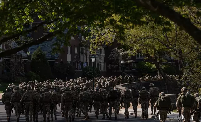 Cadets compete in a timed eight mile ruck during the Sandhurst Military Skills Competition at the United States Military Academy in West Point, N.Y., Friday, May 1, 2026. (AP Photo/Julia Demaree Nikhinson)