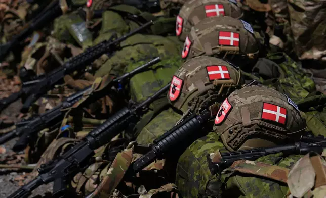 Gear of Danish cadets rests on the ground before the zodiac boat portion of the Sandhurst Military Skills Competition at the United States Military Academy in West Point, N.Y., Friday, May 1, 2026. (AP Photo/Julia Demaree Nikhinson)