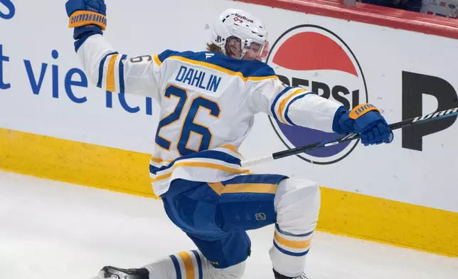 Buffalo Sabres' Rasmus Dahlin (26) celebrates his goal over Montreal Canadiens during first period second round, Game 6, NHL playoff action in Montreal on Saturday, May 16, 2026. (Christinne Muschi/The Canadian Press via AP)