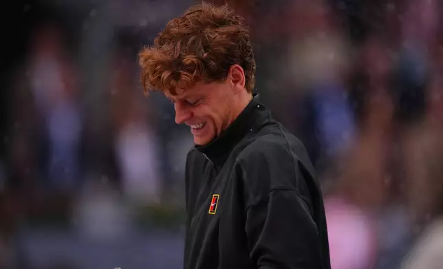 Jannik Sinner, of Italy, celebrates after winning the men's singles tennis final match against Alexander Zverev, of Germany, at the Madrid Open tennis tournament in Madrid, Spain, Sunday, May 3, 2026. (AP Photo/Manu Fernandez)