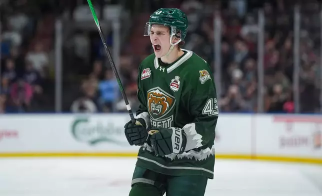 Everett Silvertips' Jaxon Pisani (43) celebrates his goal during the first period of a Memorial Cup hockey game against the Kelowna Rockets, in Kelowna, B.C., on Wednesday, May 27, 2026. (Darryl Dyck/The Canadian Press via AP)