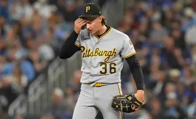 Pittsburgh Pirates pitcher Bubba Chandler (36) reacts during third inning of a baseball game in Toronto, Friday, May 22, 2026. (Chris Young/The Canadian Press via AP)