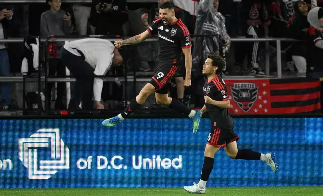 D.C. United forward Tai Baribo (9) celebrates his goal next to defender Keisuke Kurokawa, right, during the second half of an MLS soccer match against CF Montreal, Saturday, May 23, 2026, in Washington. (AP Photo/Nick Wass)