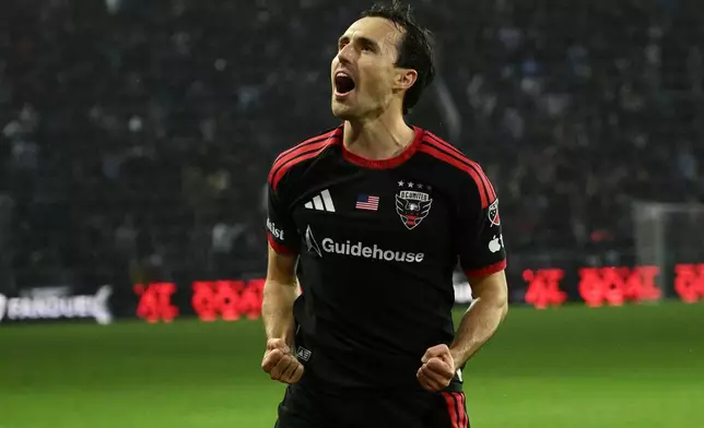 D.C. United midfielder Jared Stroud celebrates after his goal during the first half of an MLS soccer match against CF Montreal, Saturday, May 23, 2026, in Washington. (AP Photo/Nick Wass)