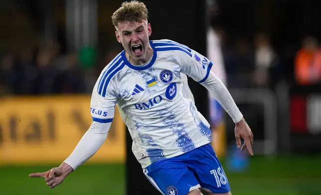 CF Montreal midfielder Hennadii Synchuk celebrates his goal during the second half of an MLS soccer match against D.C. United, Saturday, May 23, 2026, in Washington. (AP Photo/Nick Wass)