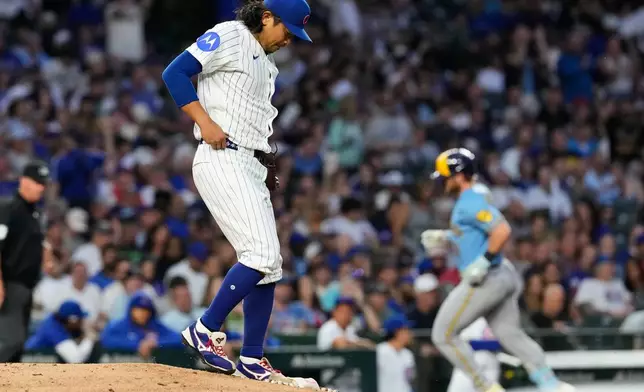 Chicago Cubs starting pitcher Shota Imanaga, of Japan, looks down after Milwaukee Brewers' Jake Bauers hit a three-run home run during the fifth inning of a baseball game in Chicago, Monday, May 18, 2026. (AP Photo/Nam Y. Huh)