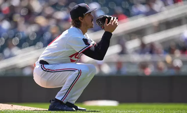 Minnesota Twins starting pitcher Joe Ryan (41) reacts while pitching during the third inning of a baseball game against the Houston Astros, Wednesday, May 20, 2026, in Minneapolis. (AP Photo/Abbie Parr)