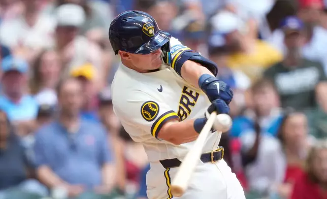 Milwaukee Brewers' Andrew Vaughn hits a double during the fourth inning of a baseball game against the St. Louis Cardinals Monday, May 25, 2026, in Milwaukee. (AP Photo/Kayla Wolf)