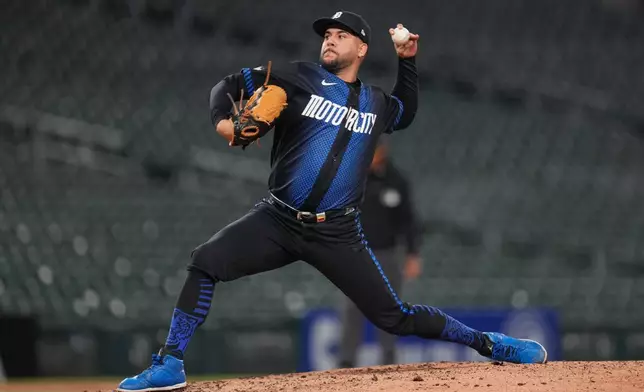 Detroit Tigers pitcher Enmanuel de Jesus throws against the Boston Red Sox during the seventh inning of a baseball game Monday, May 4, 2026, in Detroit. (AP Photo/Paul Sancya)