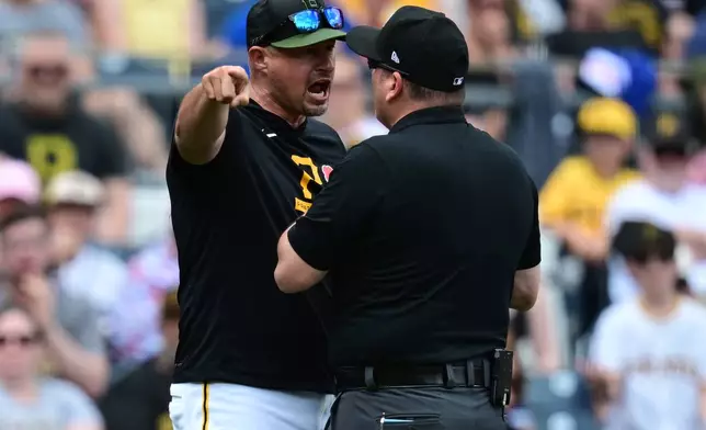 Pittsburgh Pirates manager Don Kelly argues with umpire Dan Bellino after being ejected during the second inning of a baseball game against the Chicago Cubs, Monday, May 25, 2026, in Pittsburgh. (AP Photo/David Dermer)