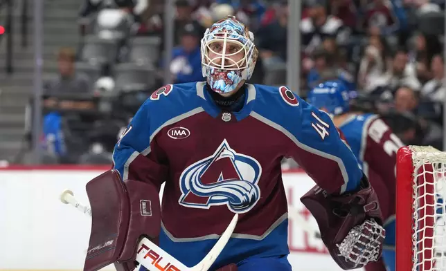 Colorado Avalanche goaltender Scott Wedgewood prepares for the second period in Game 2 of the Western Conference finals NHL hockey Stanley Cup playoff series against the Vegas Golden Knights, Friday, May 22, 2026, in Denver. (AP Photo/David Zalubowski)